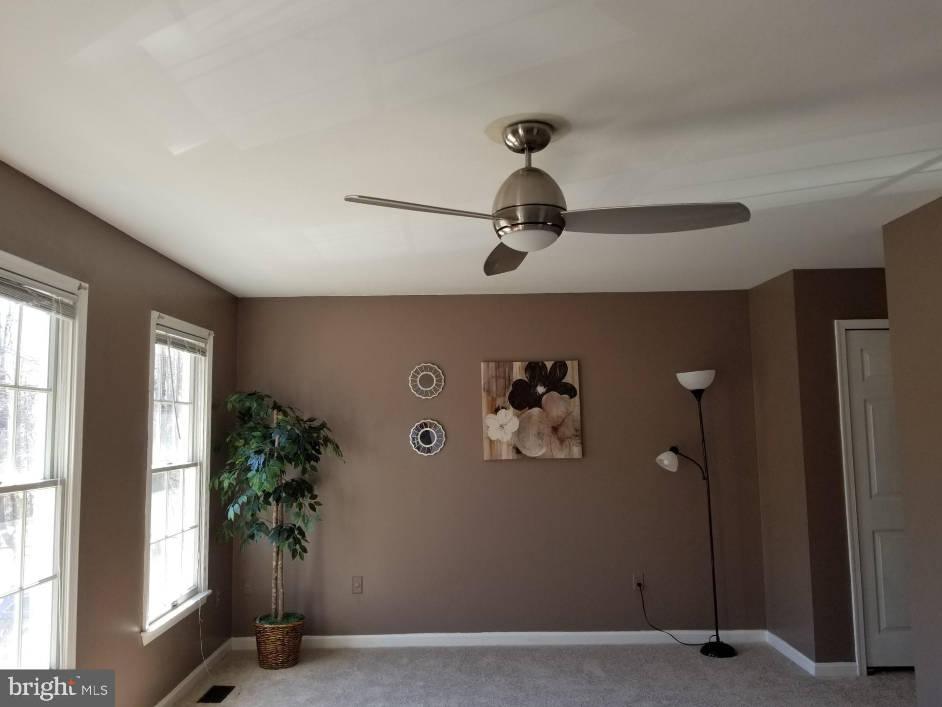 1404 Hunting Wood Road Annapolis, MD 21403 - Photo 10 of 15 a view of a livingroom with a potted plant
