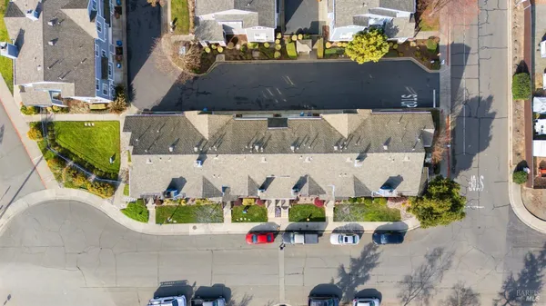 an aerial view of a houses with outdoor space