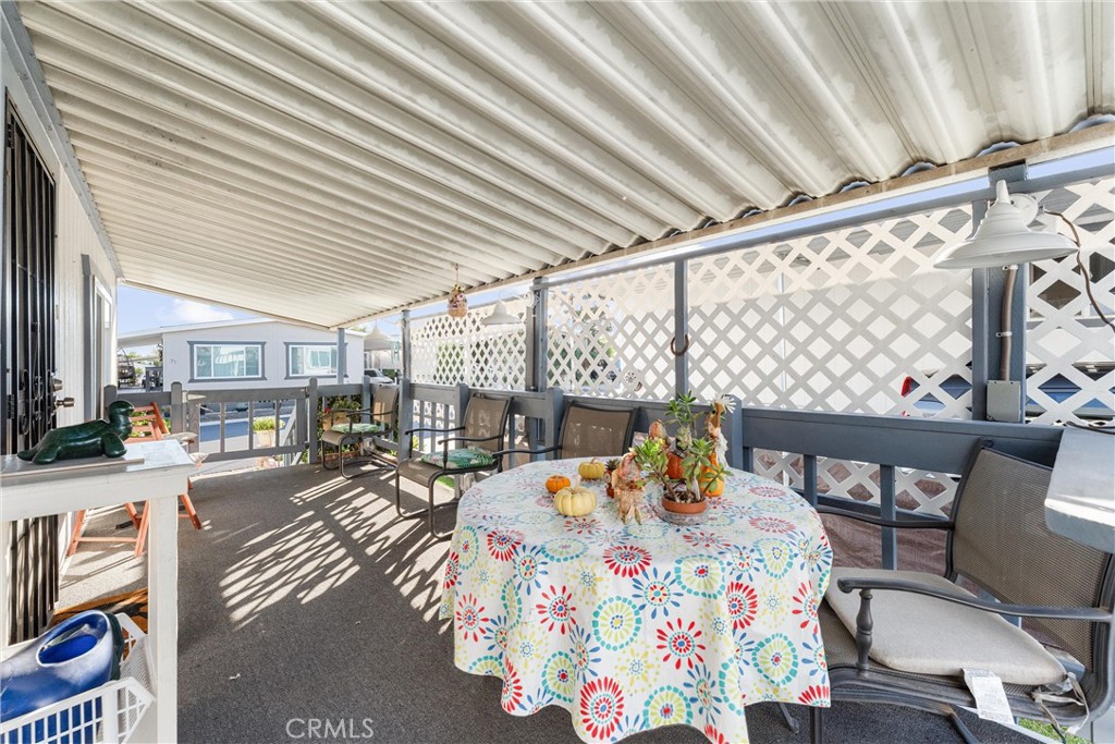 692 North Adele, Unit 64 Orange, CA 92867 - Photo 14 of 16 a bedroom with furniture and a large window