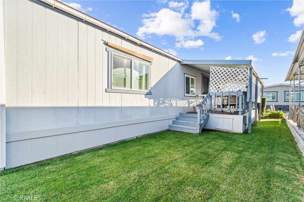 692 North Adele, Unit 64 Orange, CA 92867 - Photo 15 of 16 a view of a house with a back yard