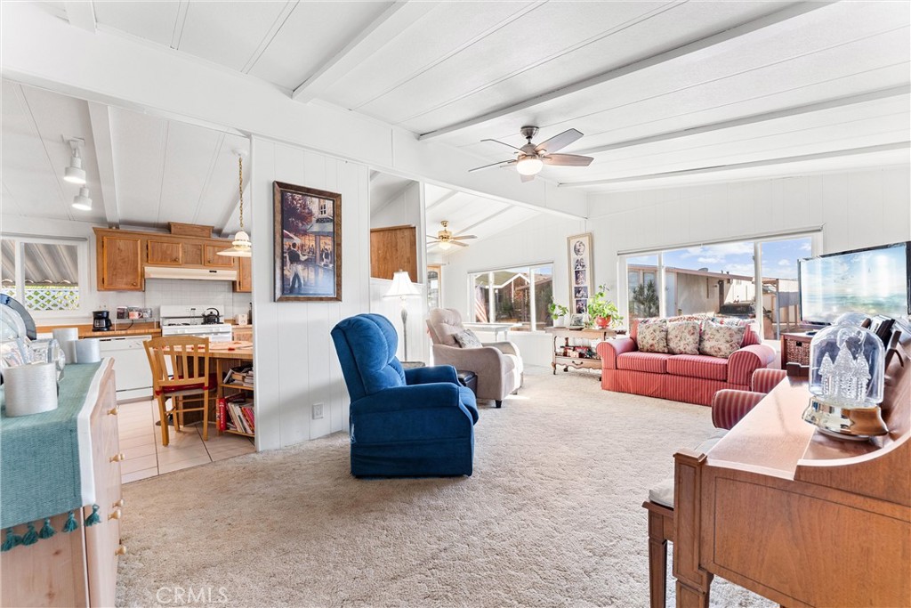 692 North Adele, Unit 64 Orange, CA 92867 - Photo 4 of 16 a living room with furniture kitchen view and a large window