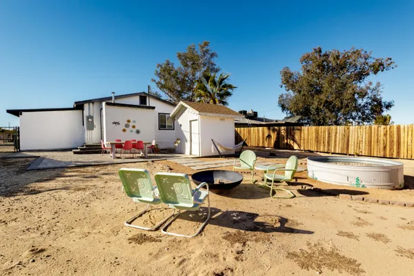 a view of a swimming pool with a lounge chair