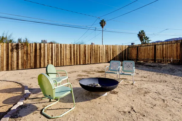 a view of a swimming pool with a lounge chair