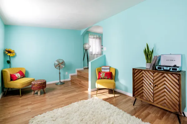 a living room with furniture and a couch