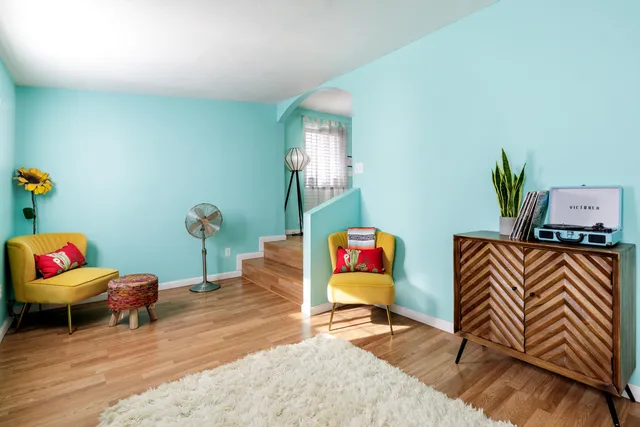 a living room with furniture and a couch