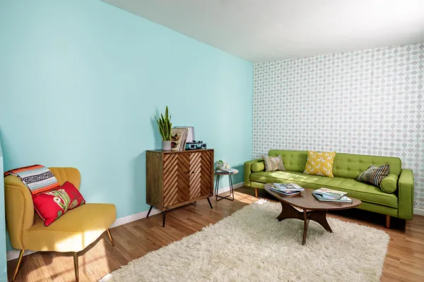 a living room with furniture and a couch