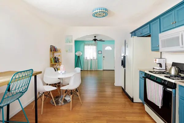 a view of a dining room with furniture