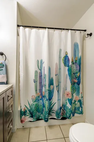 a close view of a potted plant on a granite counter