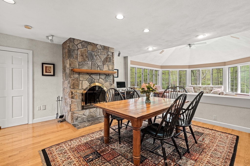 37 Old Planters Road Beverly, MA 01915 - Photo 16 of 42 a view of a dining room with furniture window and wooden floor