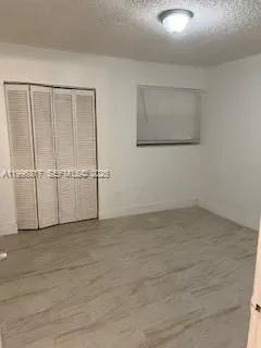 a view of a room with an empty space