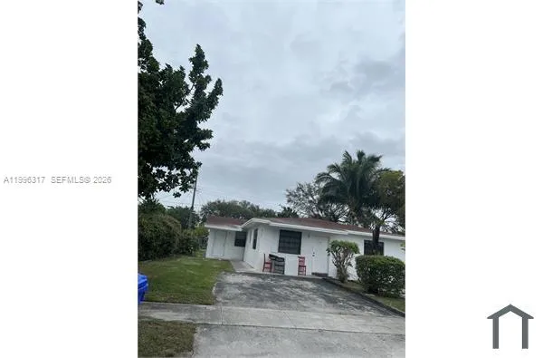 a picture of a house with a yard