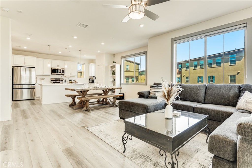 1648 Fig Tree Way Oceanside, CA 92056 - Photo 1 of 45 a living room with furniture and a table