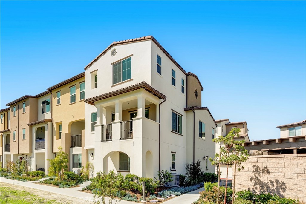 1648 Fig Tree Way Oceanside, CA 92056 - Photo 18 of 45 a front view of a house with a yard