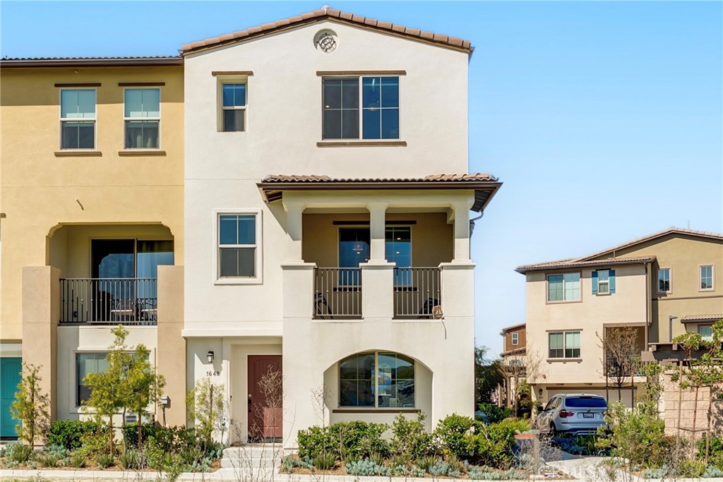 1648 Fig Tree Way Oceanside, CA 92056 - Photo 2 of 45 a front view of a house with plants