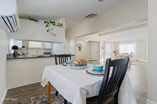 a view of a dining room with furniture