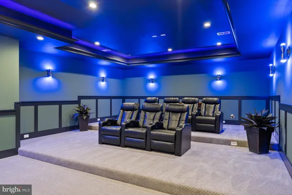 a projector room with lots of chairs and a projector