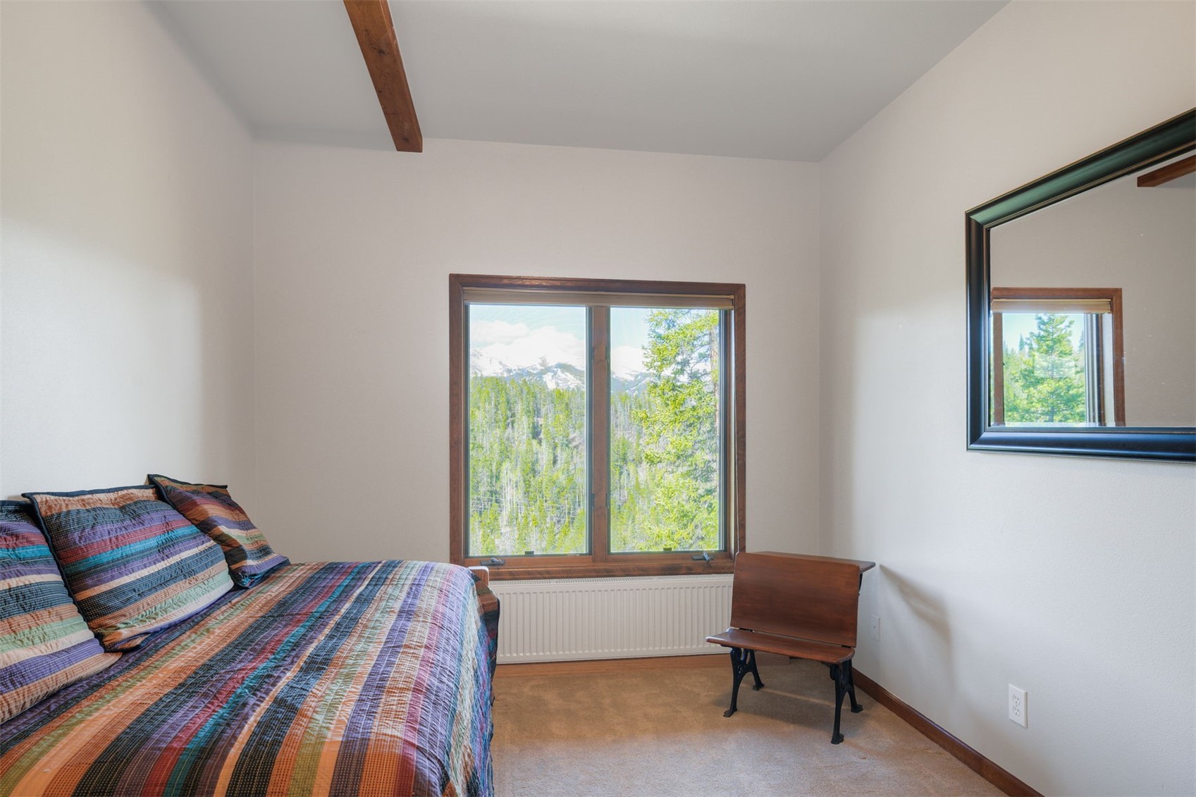 2542 Boreas Pass Road Breckenridge, CO 80424 - Photo 28 of 33 a bedroom with a bed and a window
