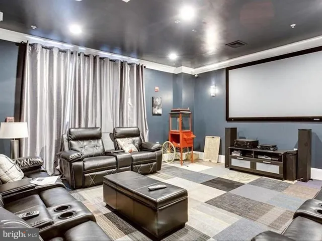 a view of a swimming pool with a lounge chair