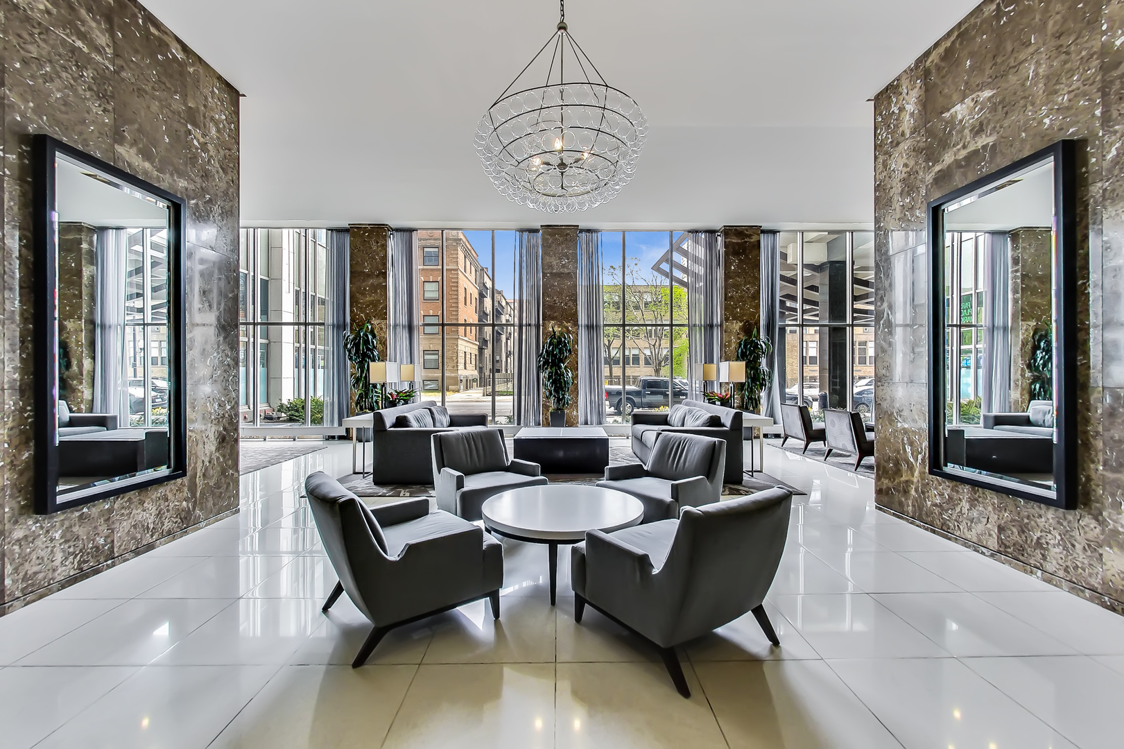 655 West Irving Park Road, Unit 606 Chicago, IL 60613 - Photo 4 of 28 a living room with furniture and floor to ceiling windows