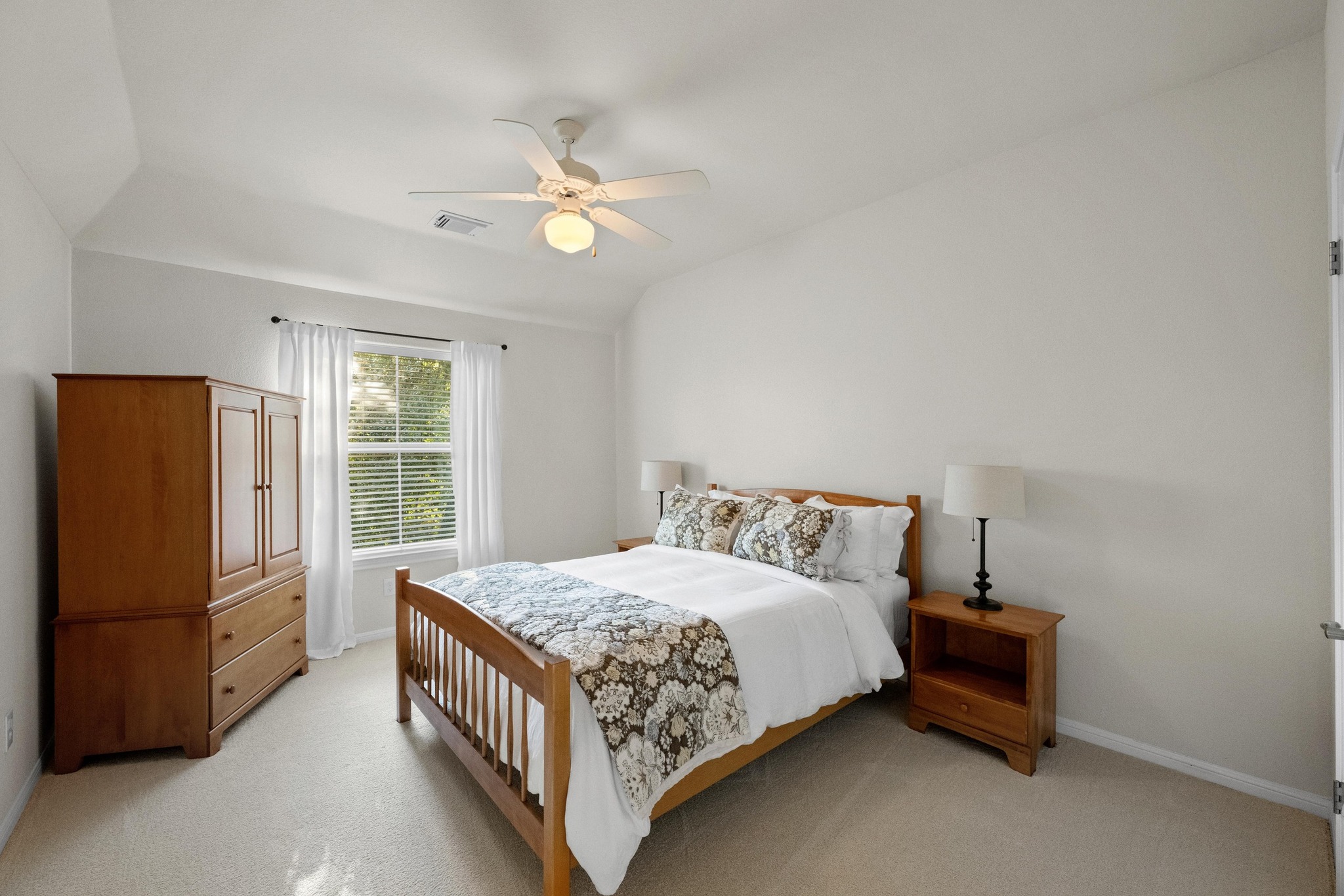 3713 Soledad Court Austin, TX 78732 - Photo 24 of 40 a bedroom with a bed and a window