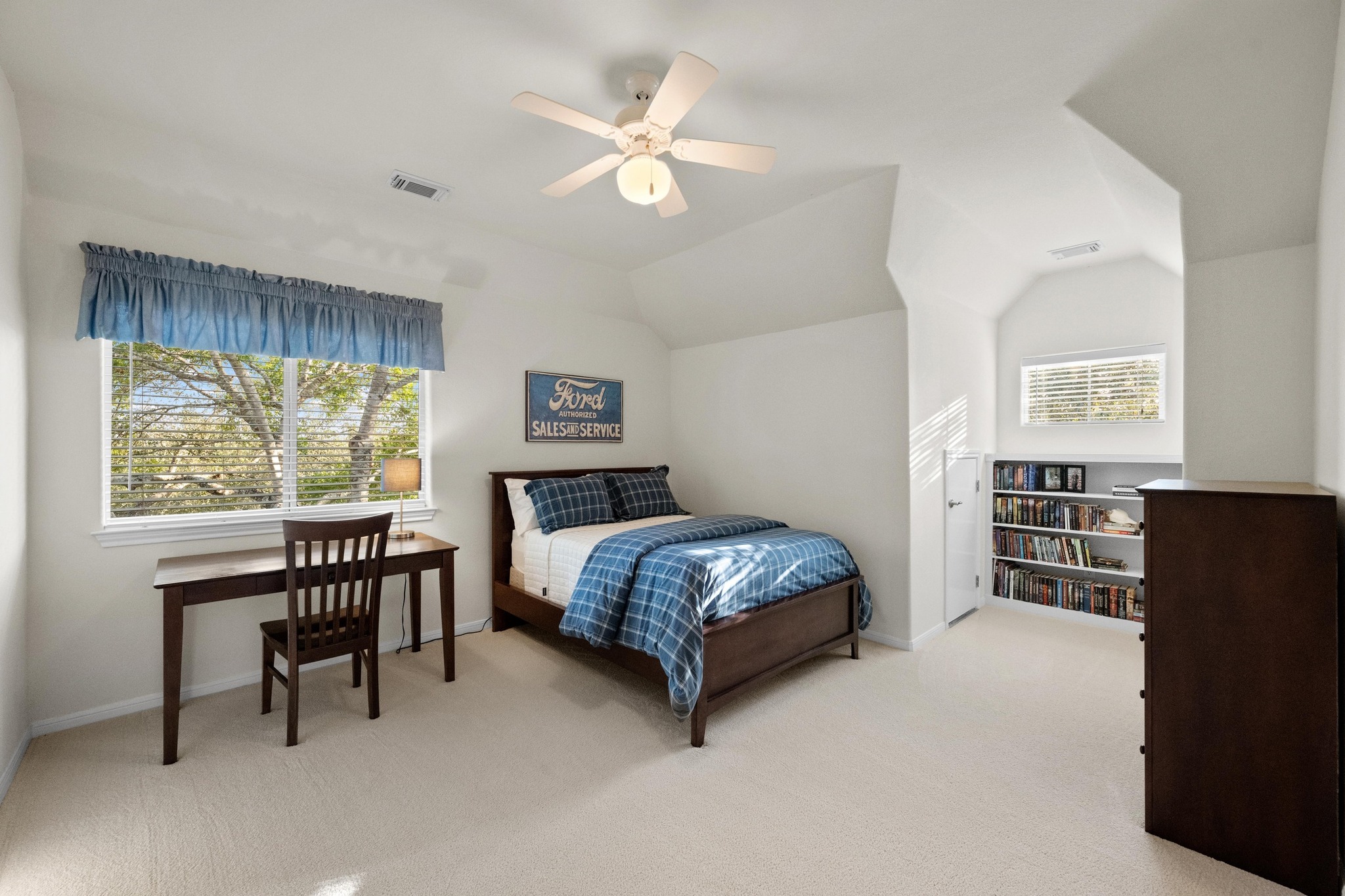 3713 Soledad Court Austin, TX 78732 - Photo 26 of 40 a living room with a bed furniture and a window