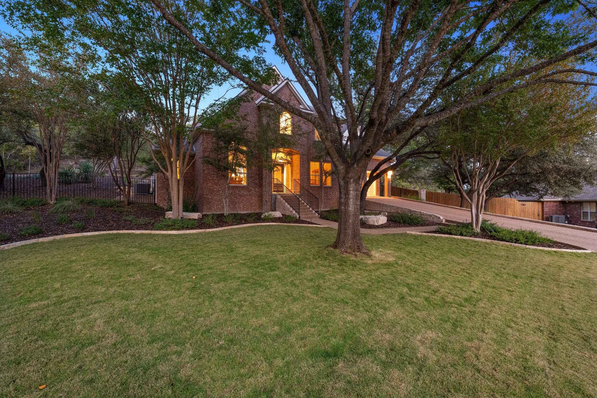 3713 Soledad Court Austin, TX 78732 - Photo 3 of 40 a view of outdoor space with deck and trees