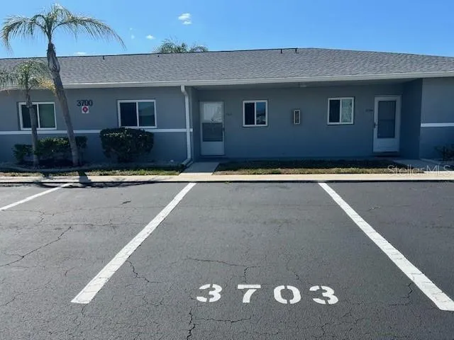 a front view of a house with yard