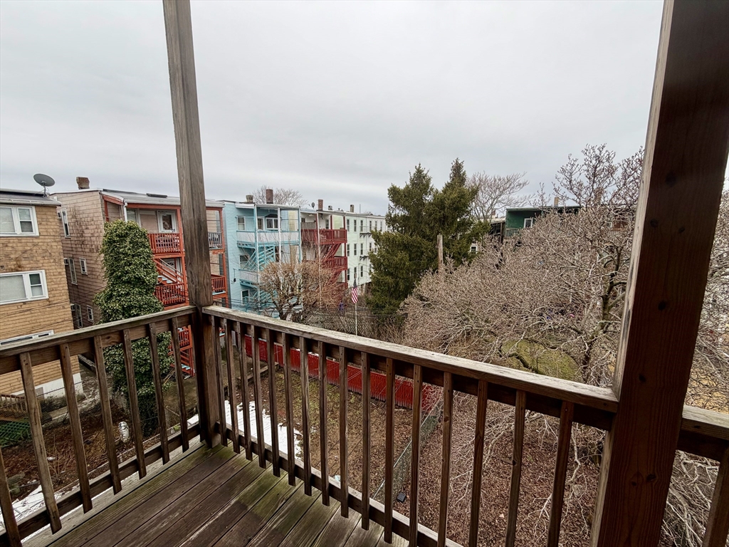 324 Chelsea Street, Unit 3 Boston, MA 02128 - Photo 10 of 20 a view of a balcony with city view