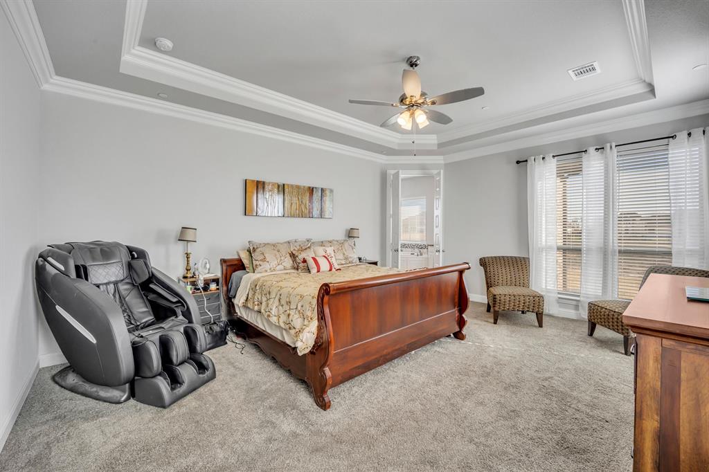 1340 Driftwood Lane Lucas, TX 75002 - Photo 17 of 23 a bedroom with bed and a large window
