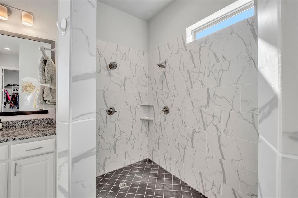 1340 Driftwood Lane Lucas, TX 75002 - Photo 19 of 23 a bathroom with a granite countertop shower