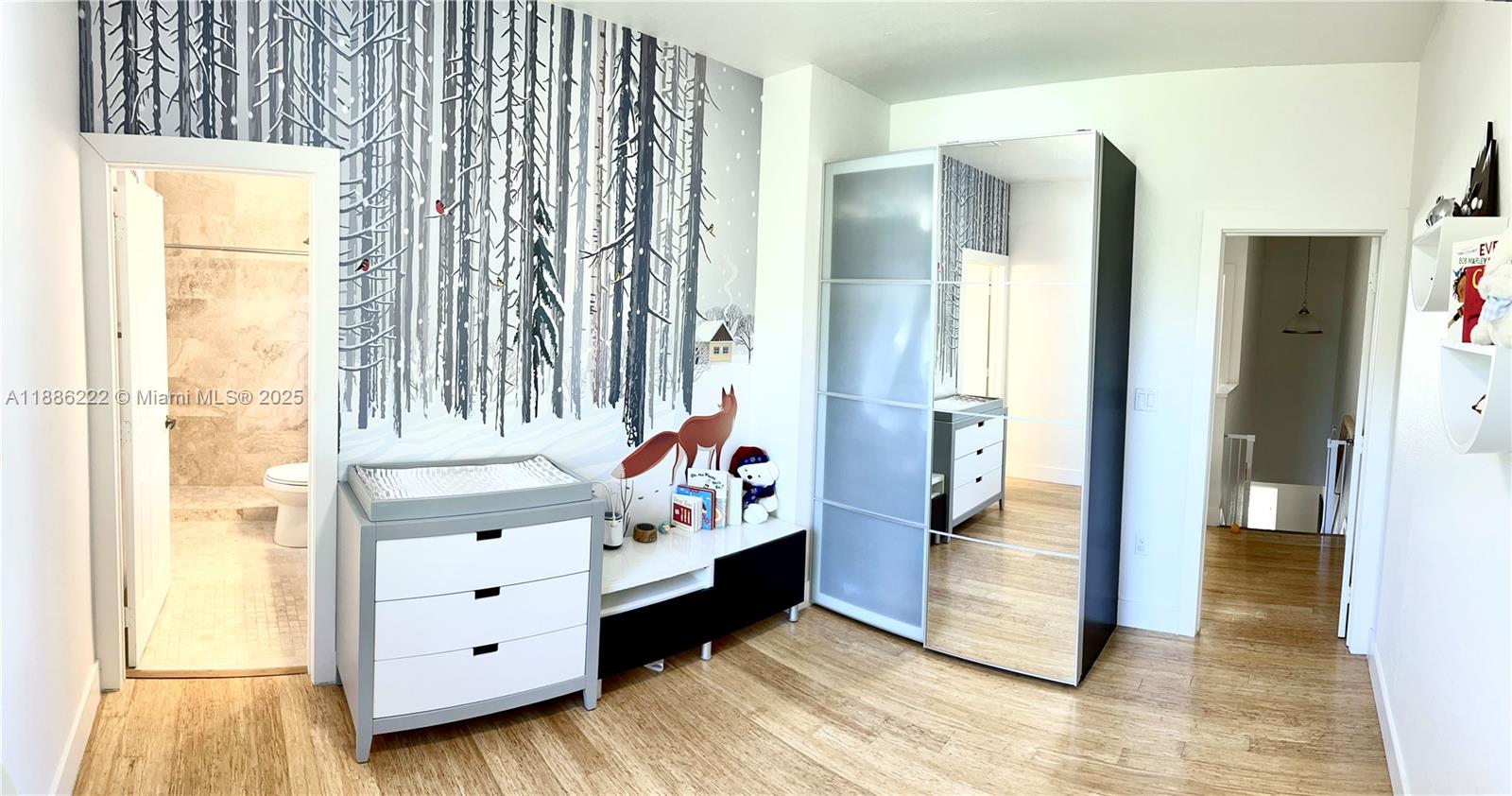 2549 Southwest 118th Way, Unit 302 Miramar, FL 33025 - Photo 24 of 43 a view of a bedroom with windows