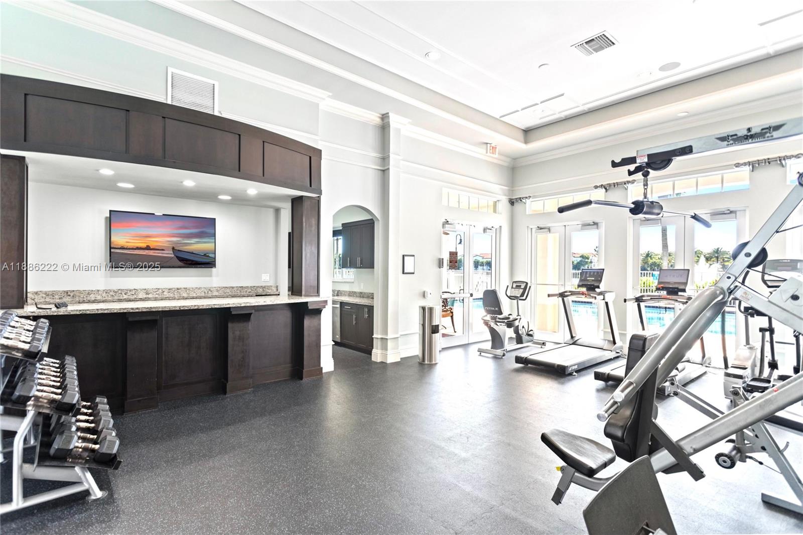 2549 Southwest 118th Way, Unit 302 Miramar, FL 33025 - Photo 33 of 43 a view of a room with gym equipment