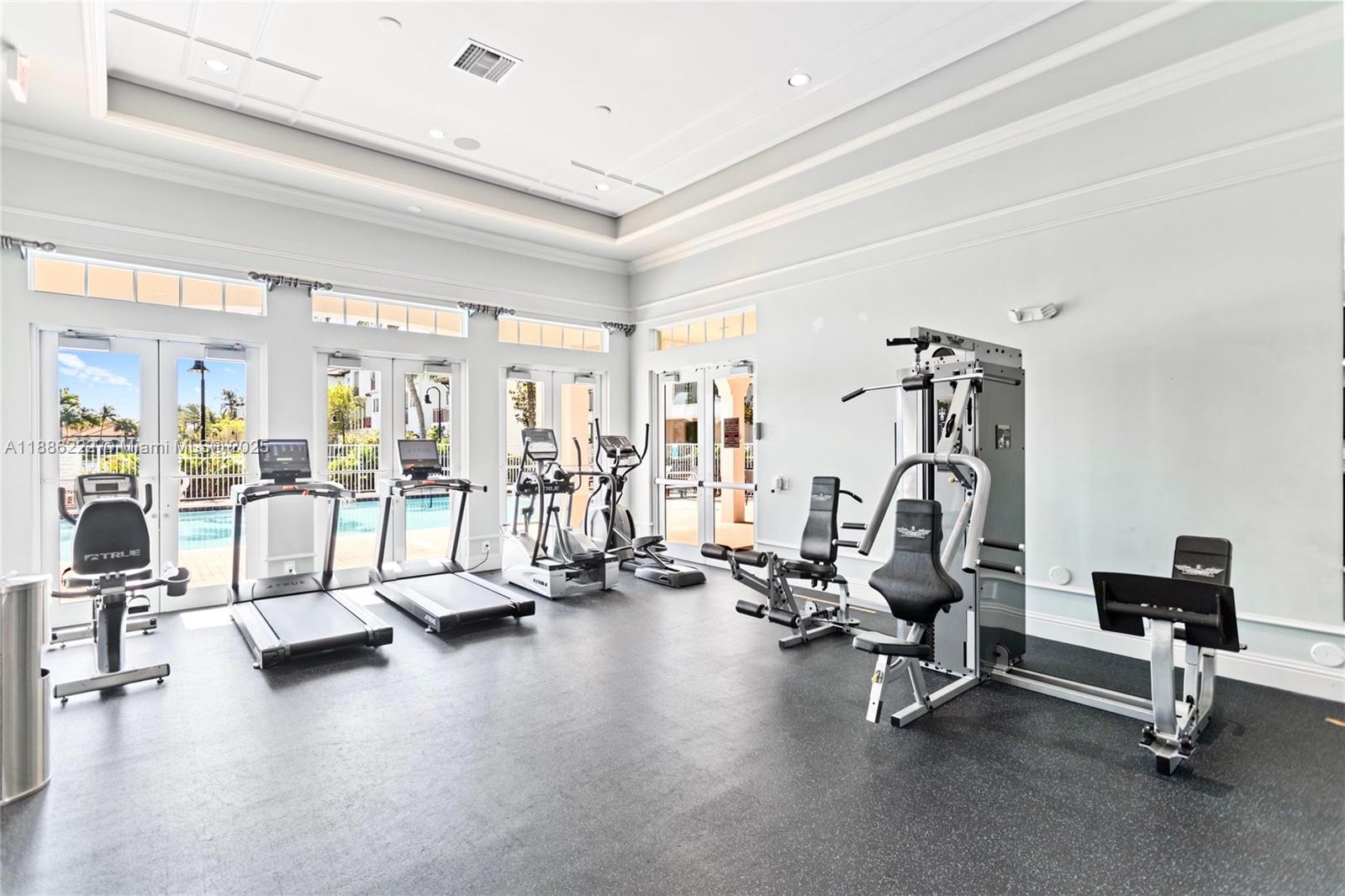 2549 Southwest 118th Way, Unit 302 Miramar, FL 33025 - Photo 34 of 43 a view of a room with gym equipment