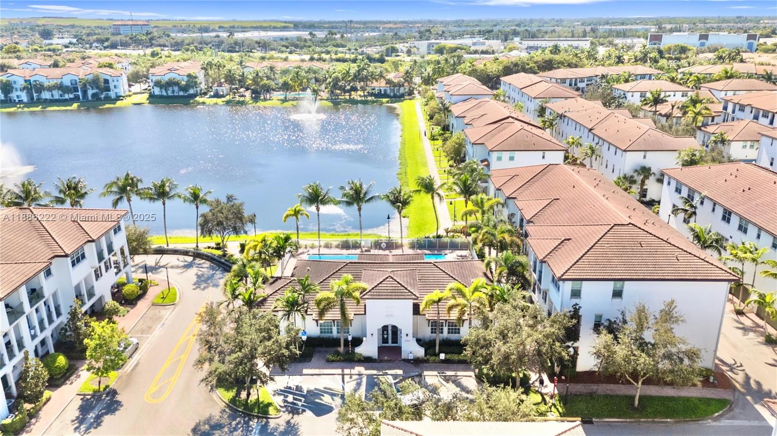 2549 Southwest 118th Way, Unit 302 Miramar, FL 33025 - Photo 42 of 43 an aerial view of residential houses with outdoor space and lake view