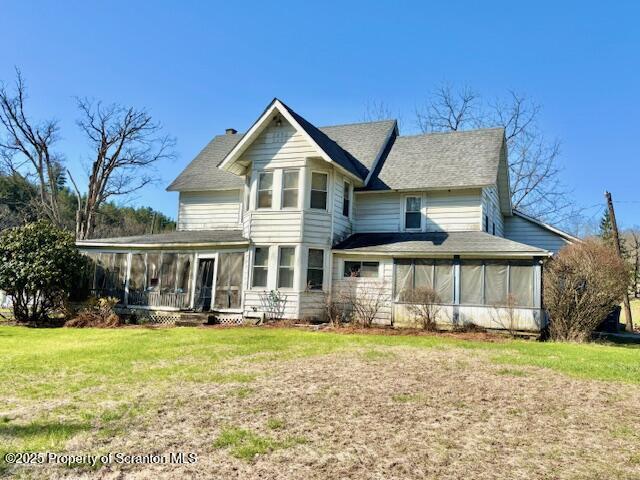 1079 Sutton Creek Road Dallas, PA 18612 - Photo 2 of 64 a front view of a house with garden