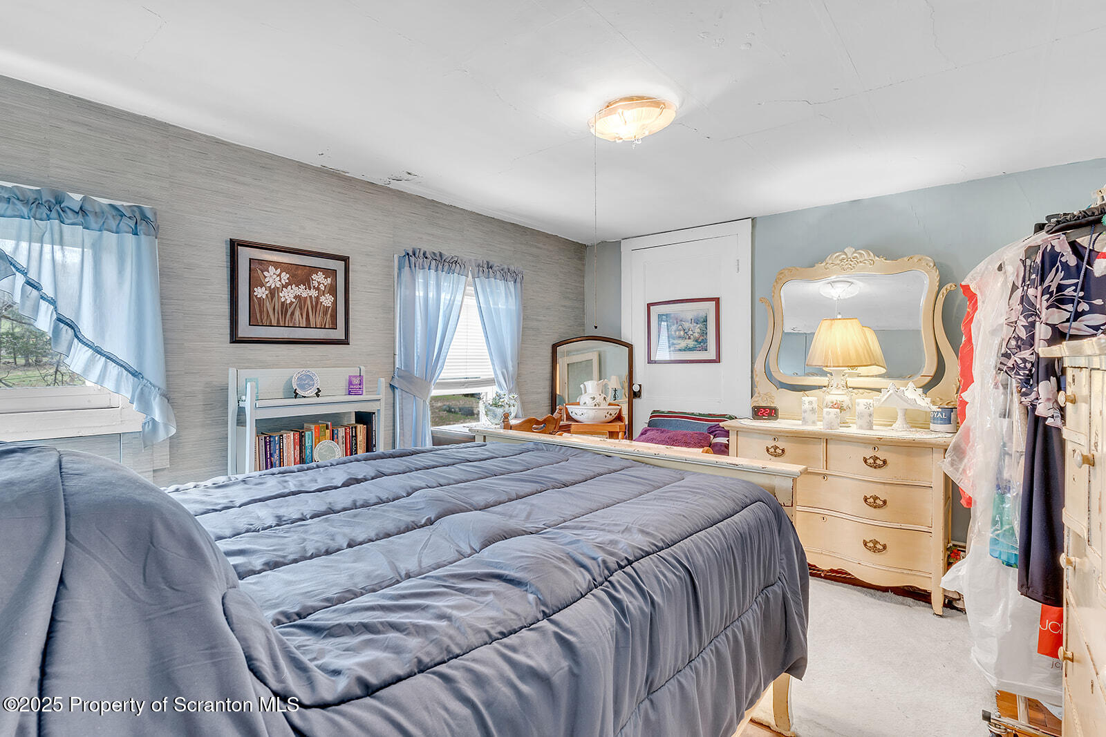 1079 Sutton Creek Road Dallas, PA 18612 - Photo 28 of 64 a bedroom with a bed and dresser