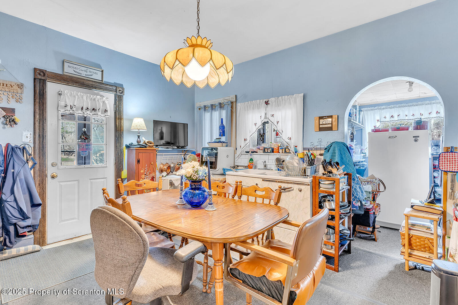 1079 Sutton Creek Road Dallas, PA 18612 - Photo 43 of 64 a view of a dining room with furniture