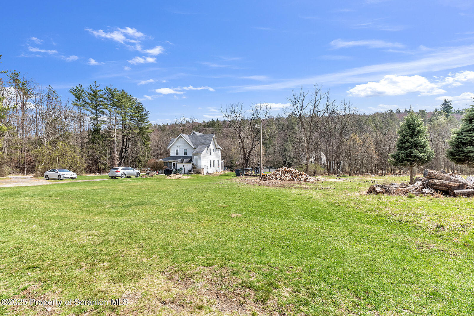 1079 Sutton Creek Road Dallas, PA 18612 - Photo 47 of 64 a view of outdoor space with garden and trees