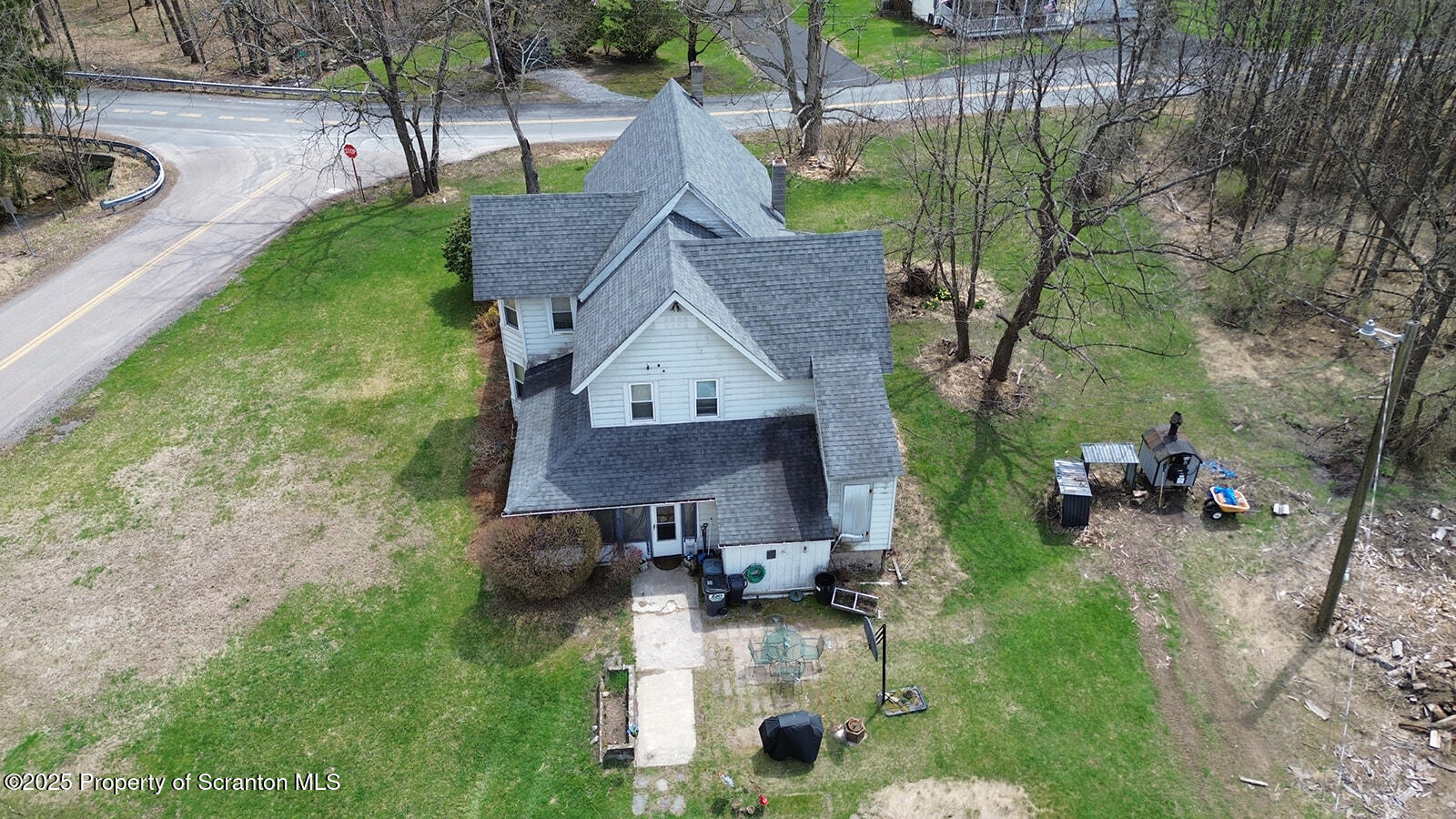 1079 Sutton Creek Road Dallas, PA 18612 - Photo 6 of 64 an aerial view of a house with yard patio and green space
