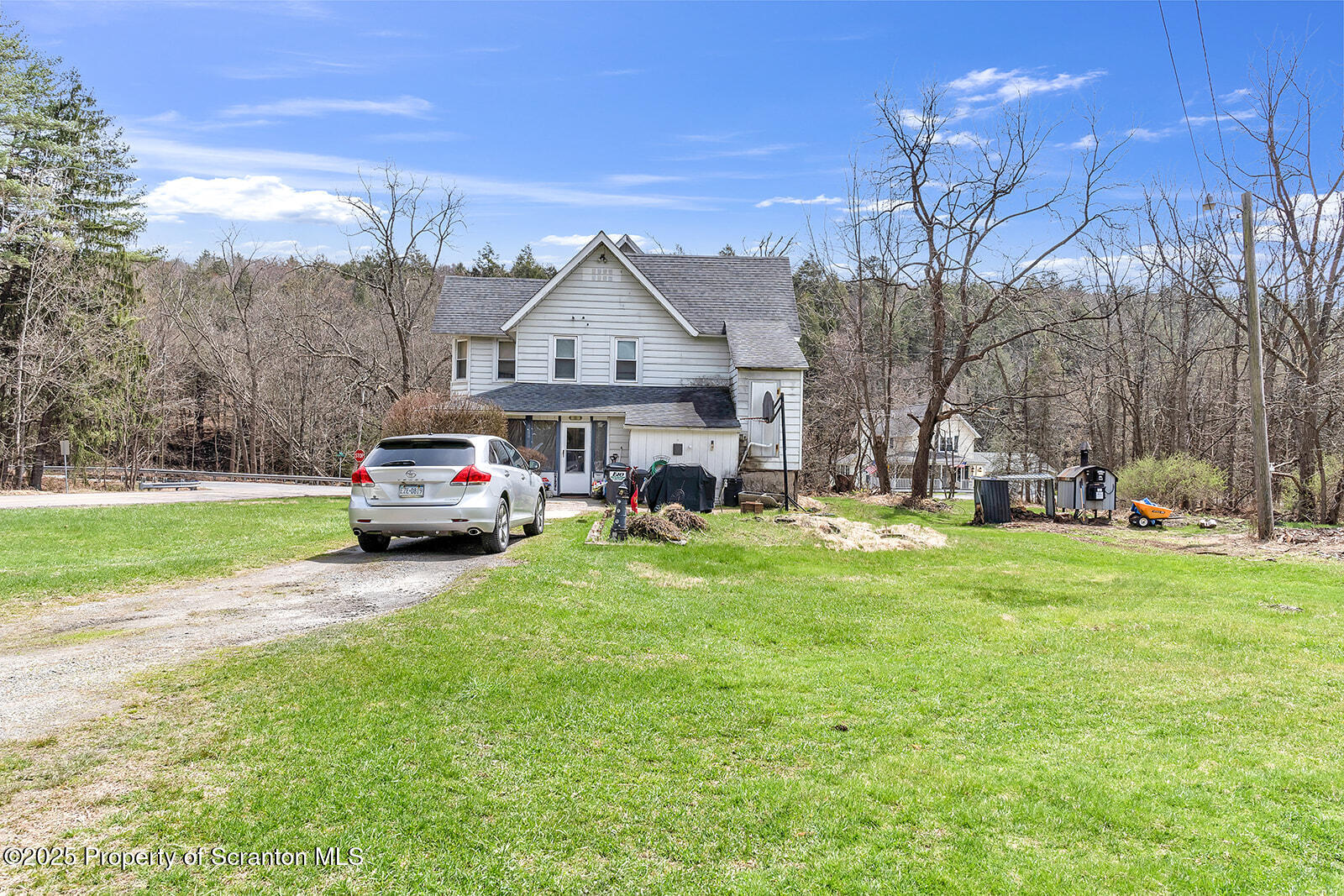 1079 Sutton Creek Road Dallas, PA 18612 - Photo 64 of 64 a house view with a garden space
