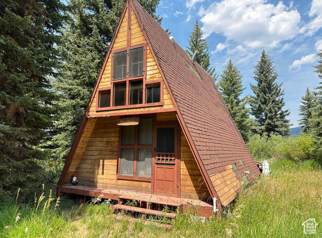 6811 Pine Springs Road Kamas, UT 84036 - Photo 1 of 1 Rear view of house with roof with shingles