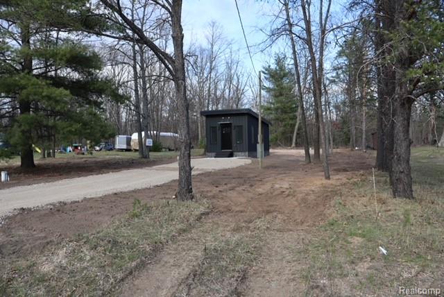 1545 South La Chance Road Lake City, MI 49651 - Photo 15 of 51 View of yard with dirt driveway