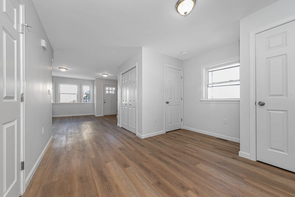 40 Everett Avenue Somerville, MA 02145 - Photo 11 of 21 a view of entryway with wooden floor