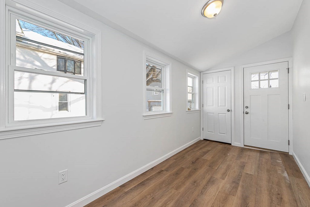 40 Everett Avenue Somerville, MA 02145 - Photo 14 of 21 a view of empty room with wooden floor and fan