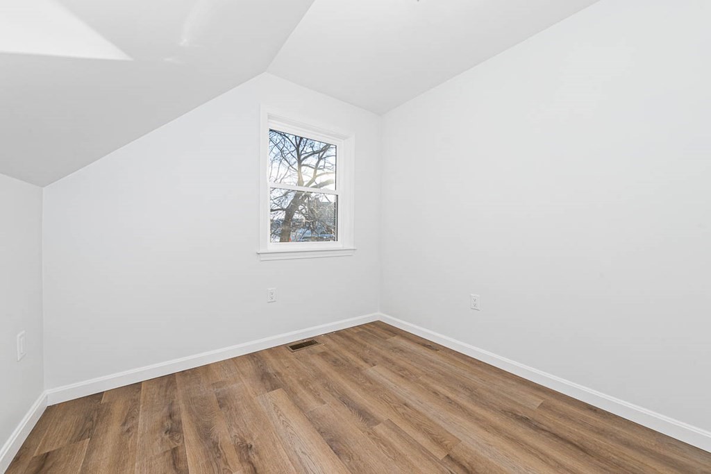 40 Everett Avenue Somerville, MA 02145 - Photo 19 of 21 an empty room with a window