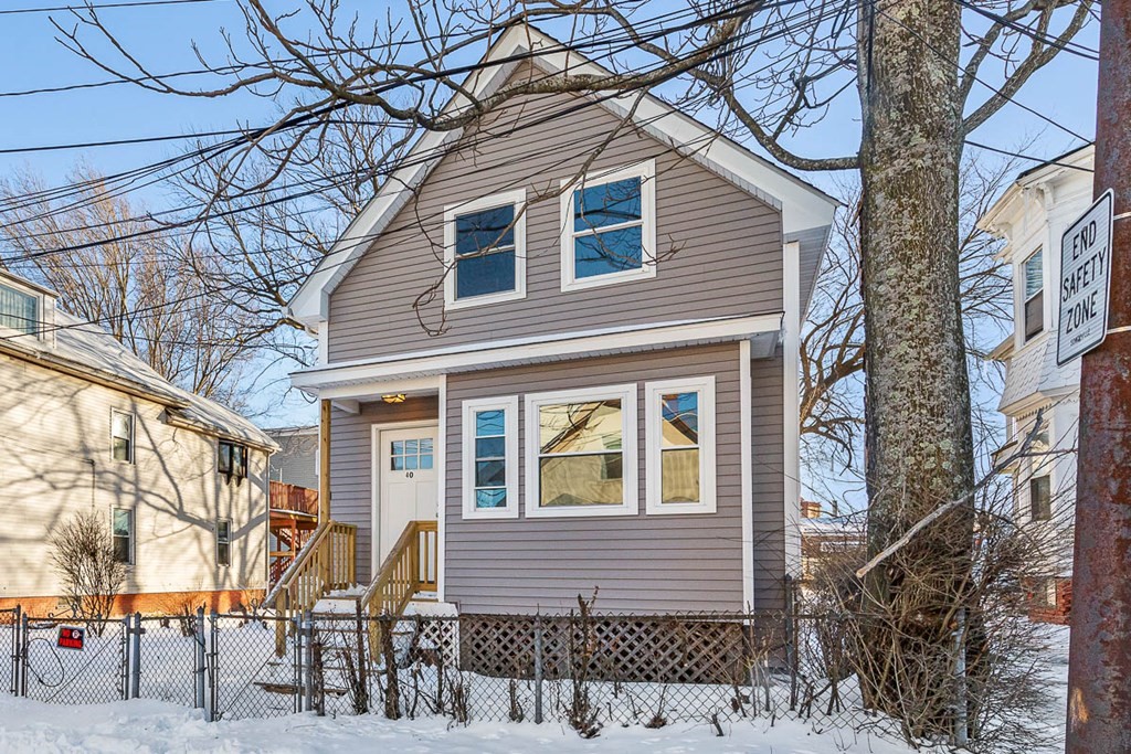40 Everett Avenue Somerville, MA 02145 - Photo 2 of 21 a front view of a house with a tree