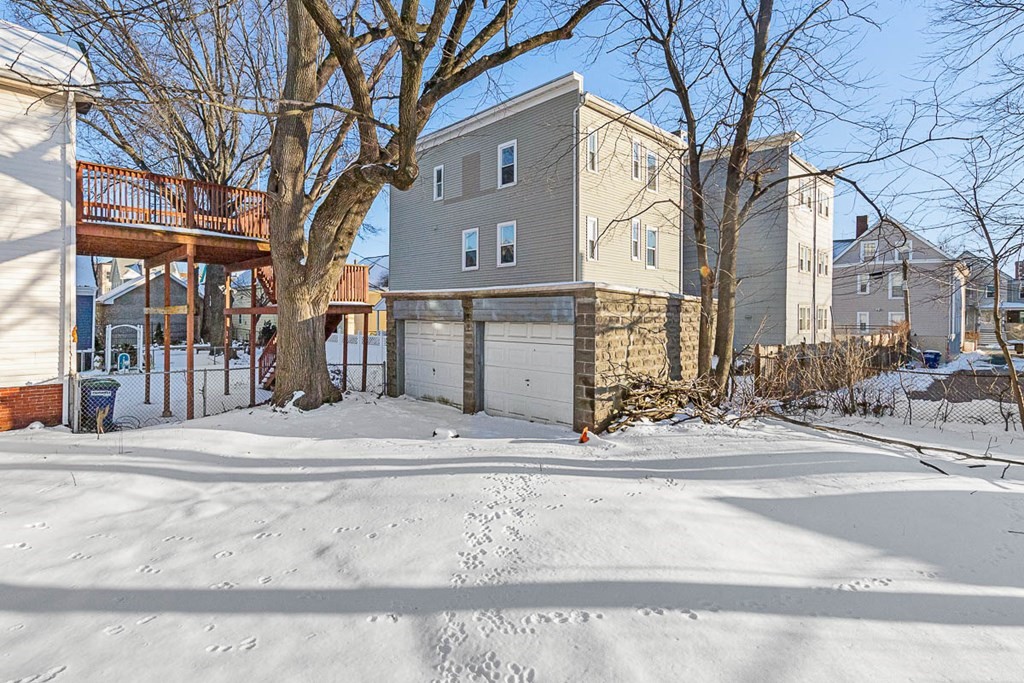 40 Everett Avenue Somerville, MA 02145 - Photo 4 of 21 a view of a house with a yard and trees
