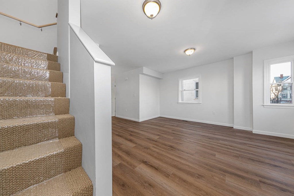 40 Everett Avenue Somerville, MA 02145 - Photo 5 of 21 a view of livingroom with furniture and wooden floor