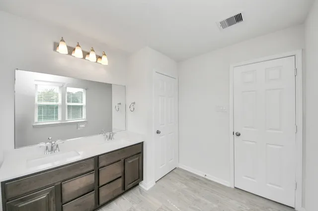 an empty room with windows