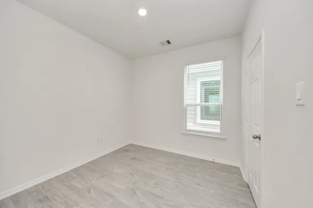 an empty room with a window